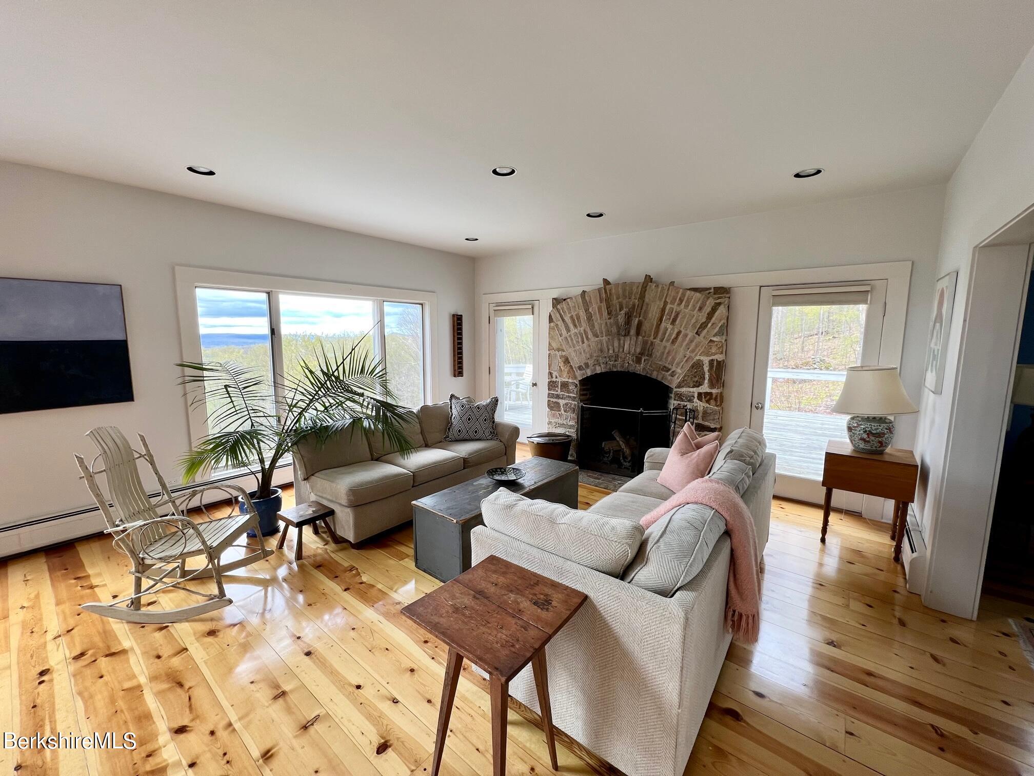 169 Mt Hunger Road Monterey, MA 01245 - Photo 19 of 51 a living room with furniture and a fireplace