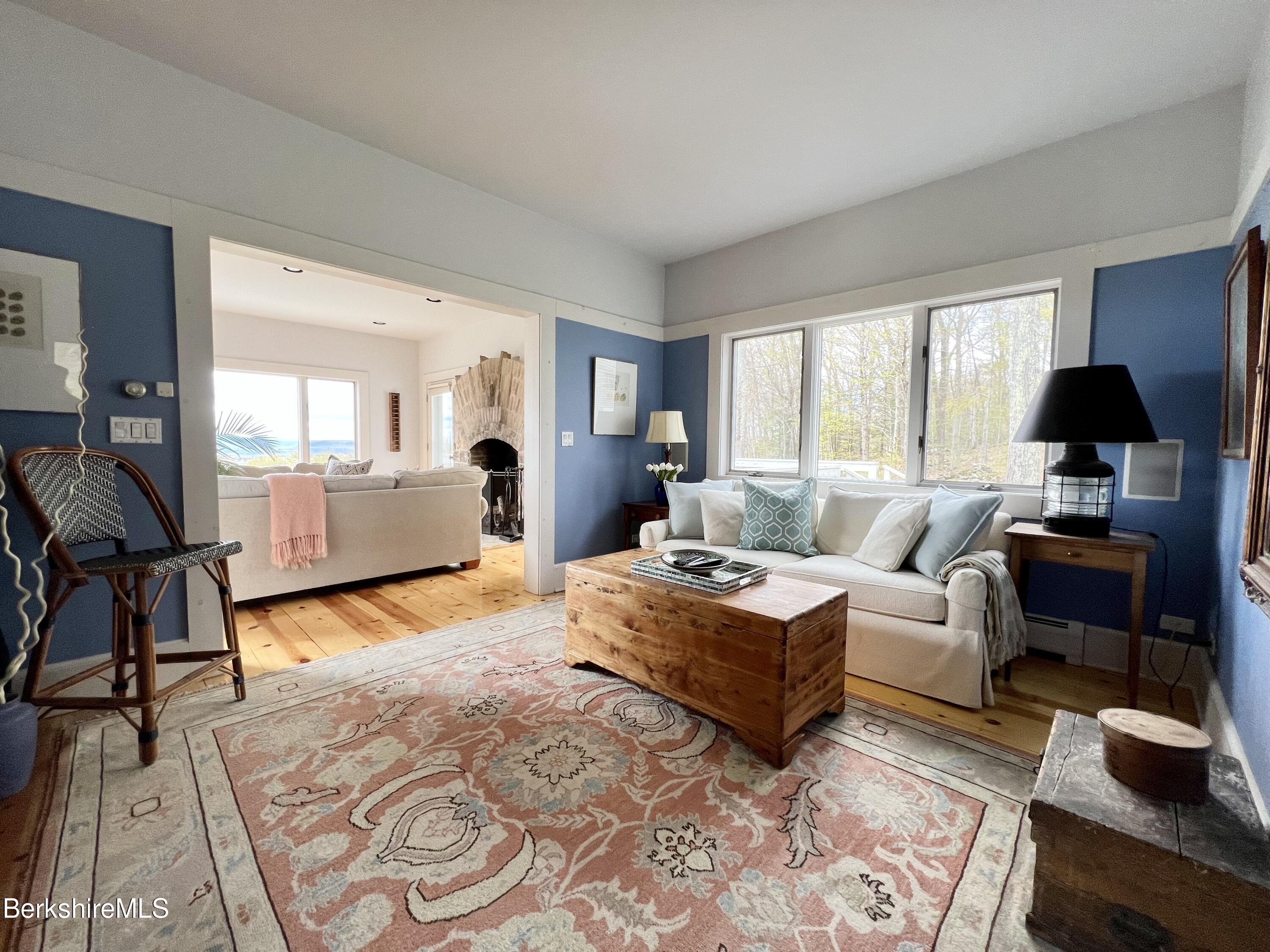 169 Mt Hunger Road Monterey, MA 01245 - Photo 20 of 51 a living room with furniture and a wooden floor