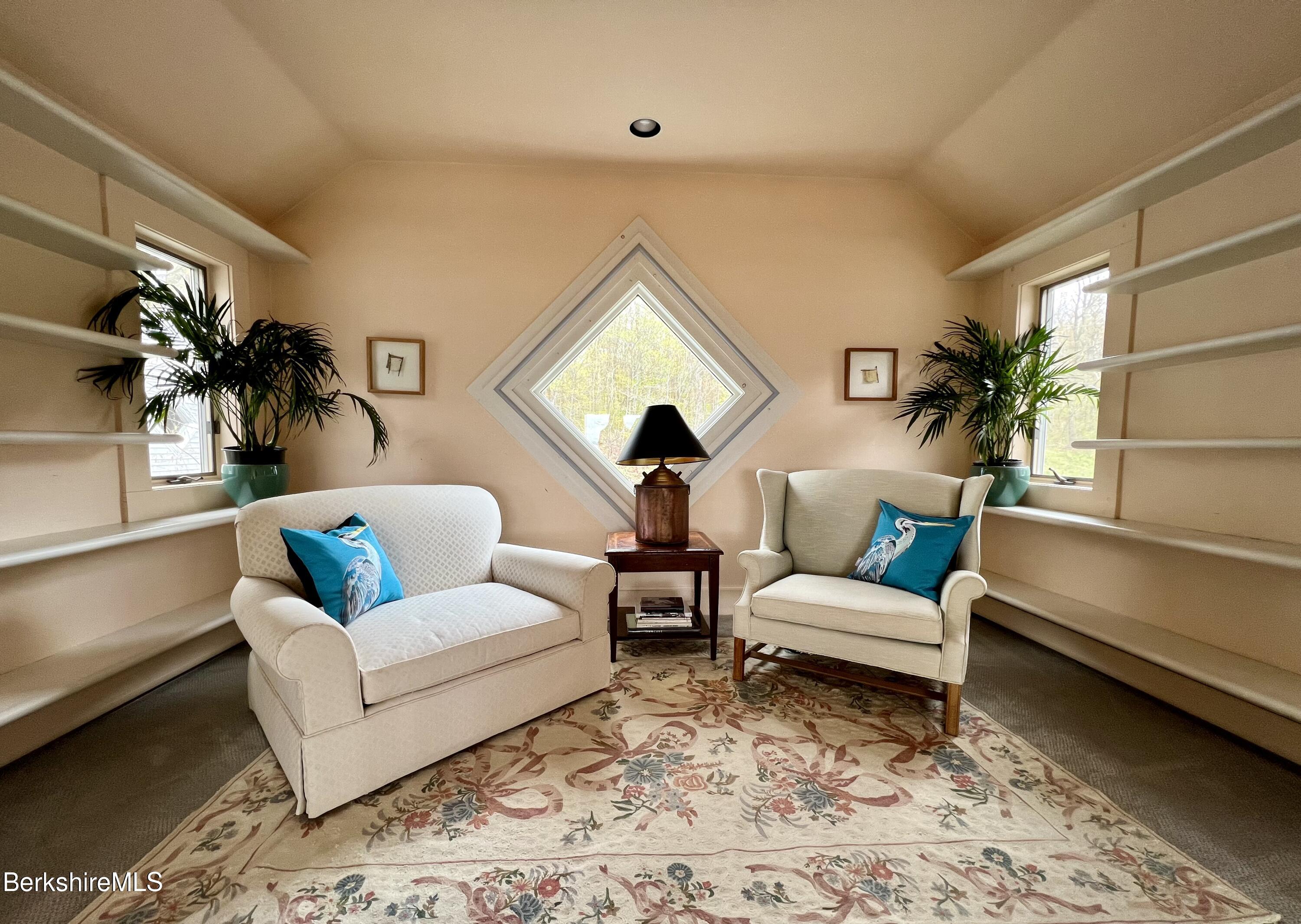 169 Mt Hunger Road Monterey, MA 01245 - Photo 25 of 51 a living room with furniture and a large window