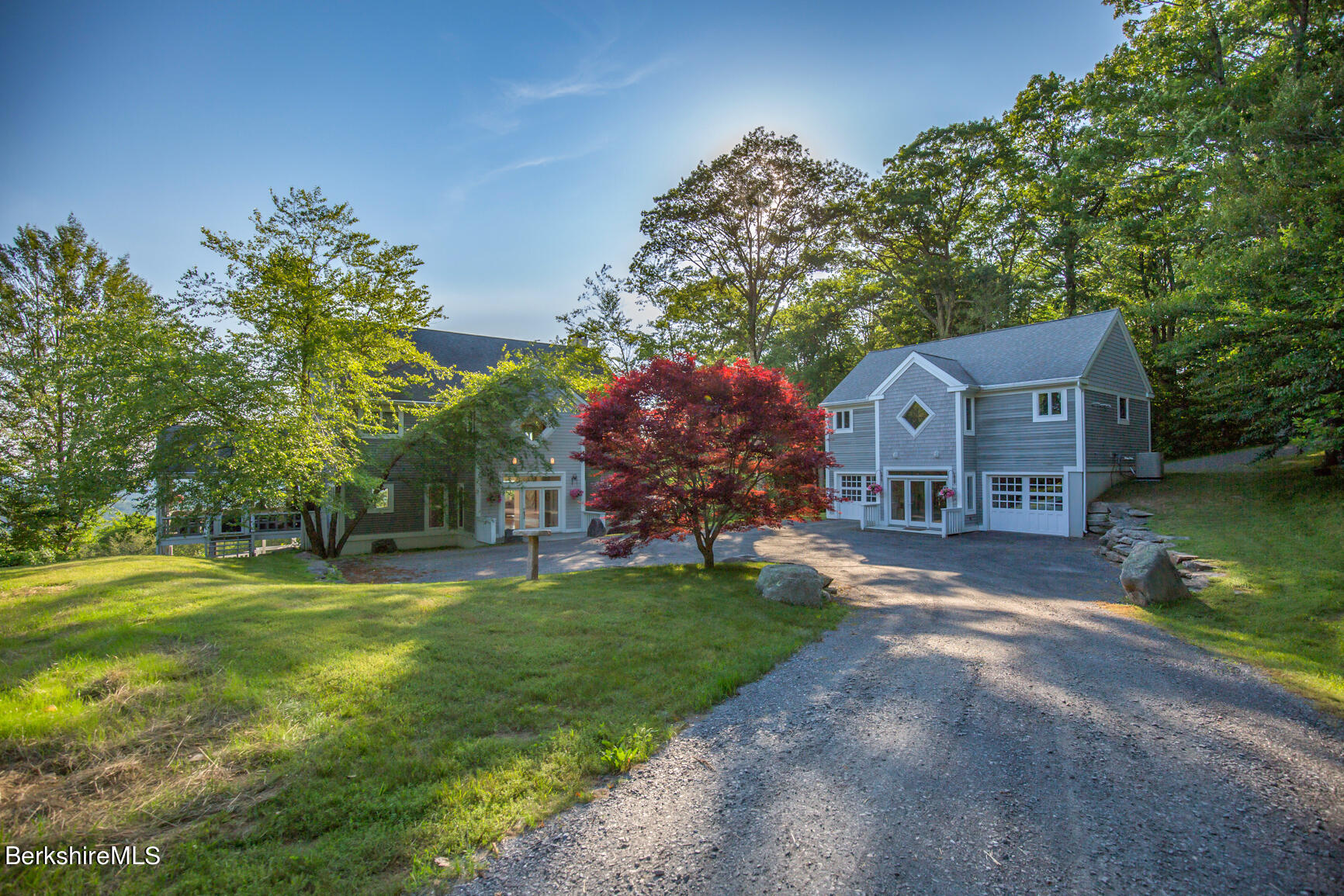 169 Mt Hunger Road Monterey, MA 01245 - Photo 4 of 51 a front view of a house with garden