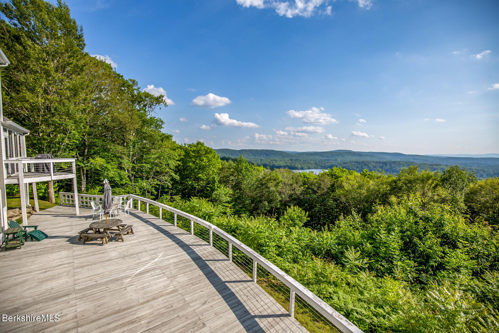 169 Mt Hunger Road Monterey, MA 01245 - Photo 42 of 51 a view of a balcony with trees