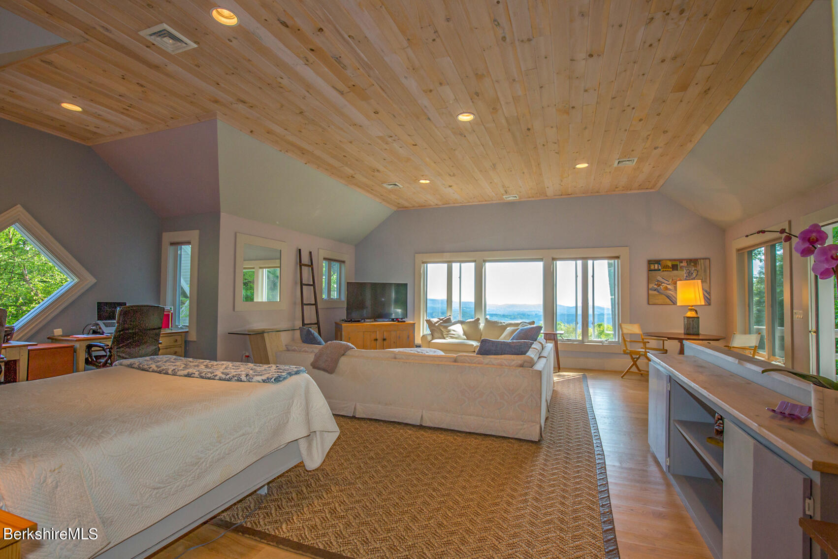 169 Mt Hunger Road Monterey, MA 01245 - Photo 47 of 51 a large bedroom with bed and large windows