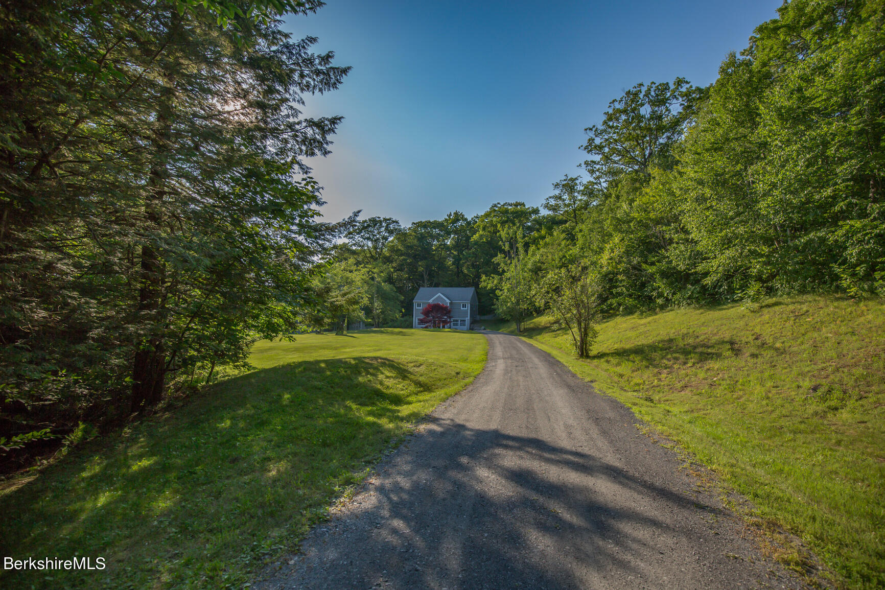 169 Mt Hunger Road Monterey, MA 01245 - Photo 50 of 51 a view of a yard with a house