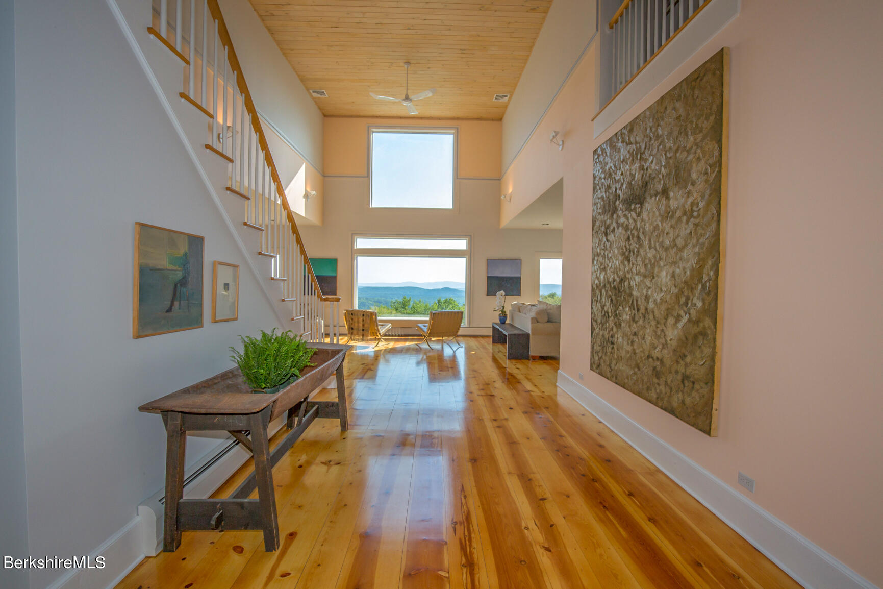 169 Mt Hunger Road Monterey, MA 01245 - Photo 6 of 51 a living room with furniture and a wooden floor