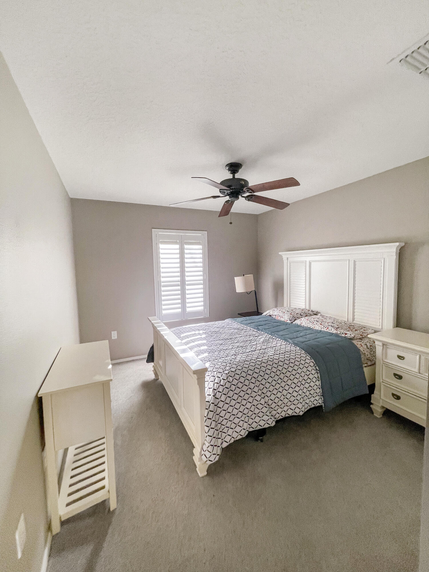 1641 Strathmore Circle Mount Dora, FL 32757 - Photo 13 of 21 a bedroom with a bed and window
