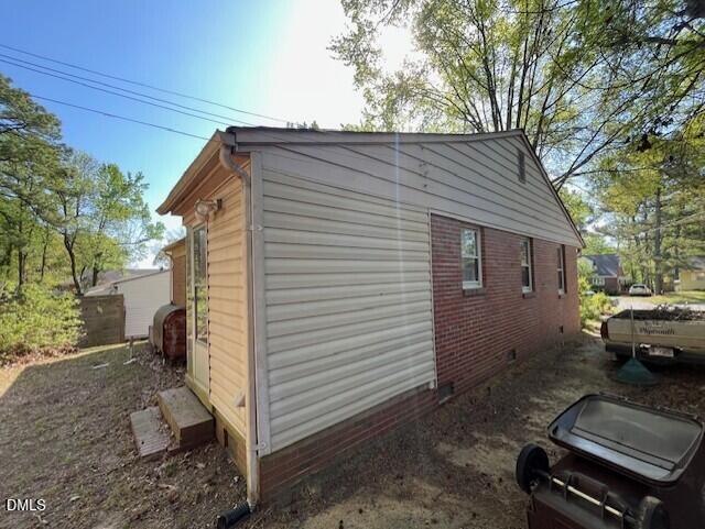 409 Edward Street Durham, NC 27701 - Photo 23 of 39 a view of a house with a yard