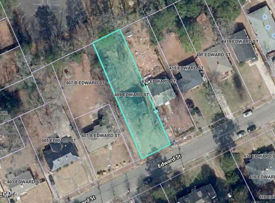 409 Edward Street Durham, NC 27701 - Photo 3 of 39 an aerial view of a house with a yard