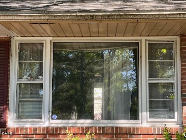 409 Edward Street Durham, NC 27701 - Photo 38 of 39 a view of a window with a tree outside front of it