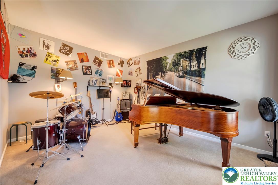204 Bushkill Ridge Road Wind Gap, PA 18091 - Photo 21 of 48 An inviting creative space awaits, complete with soft carpeting and warm, overhead lighting.