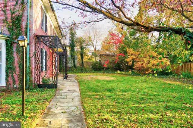 a backyard of a house with lots of green space