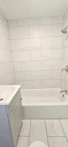 a bathroom with a bathtub