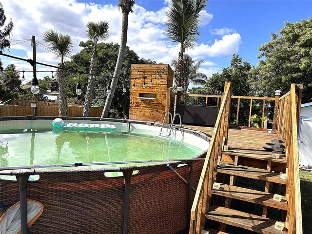 a view of a balcony with two chairs