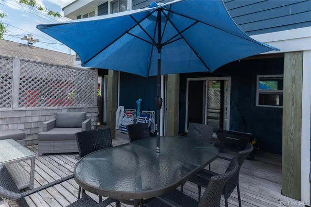 a outdoor space with patio the couches and a umbrella