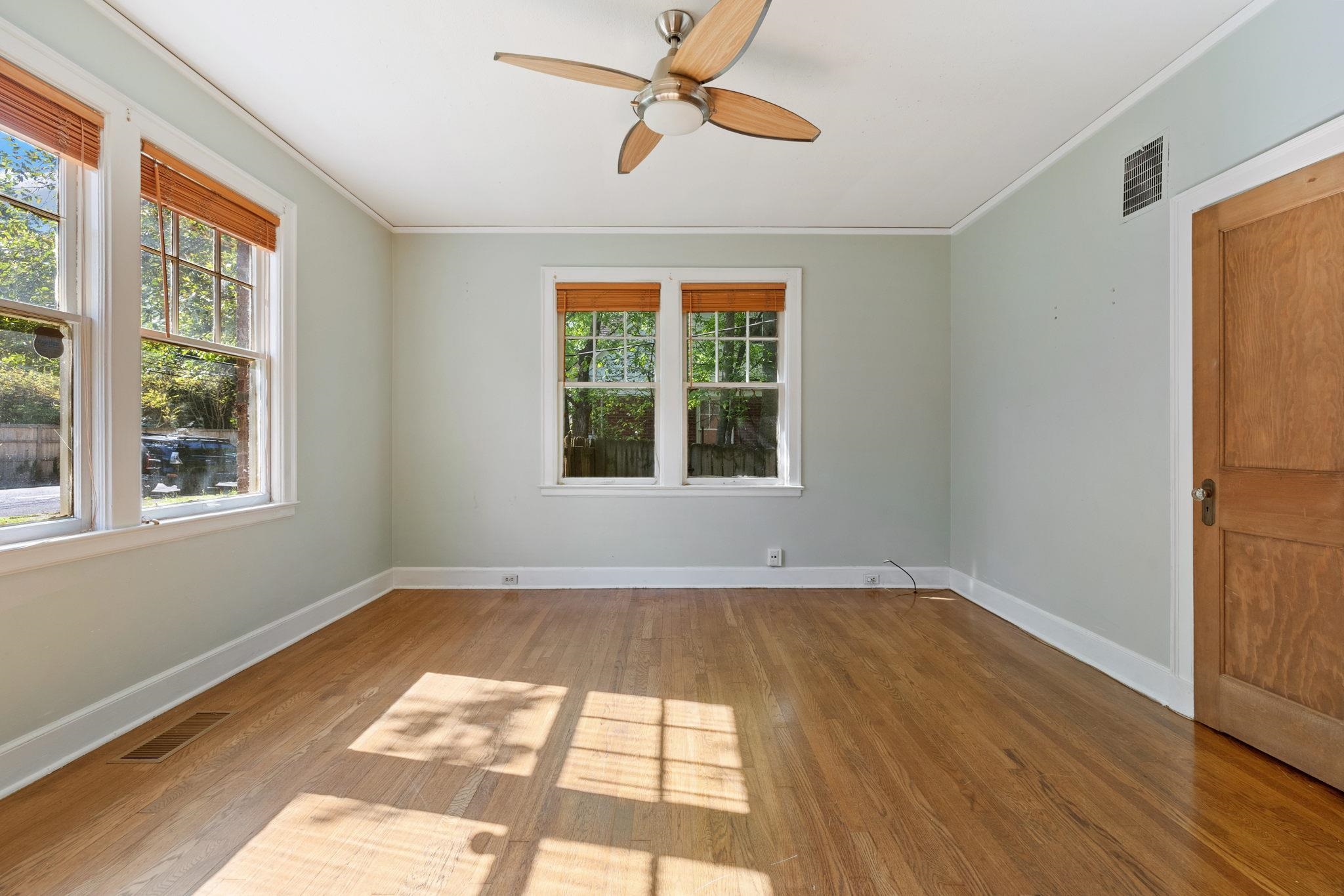99 South Fenwick Road Memphis, TN 38111 - Photo 17 of 25 a view of an empty room with a window and wooden floor