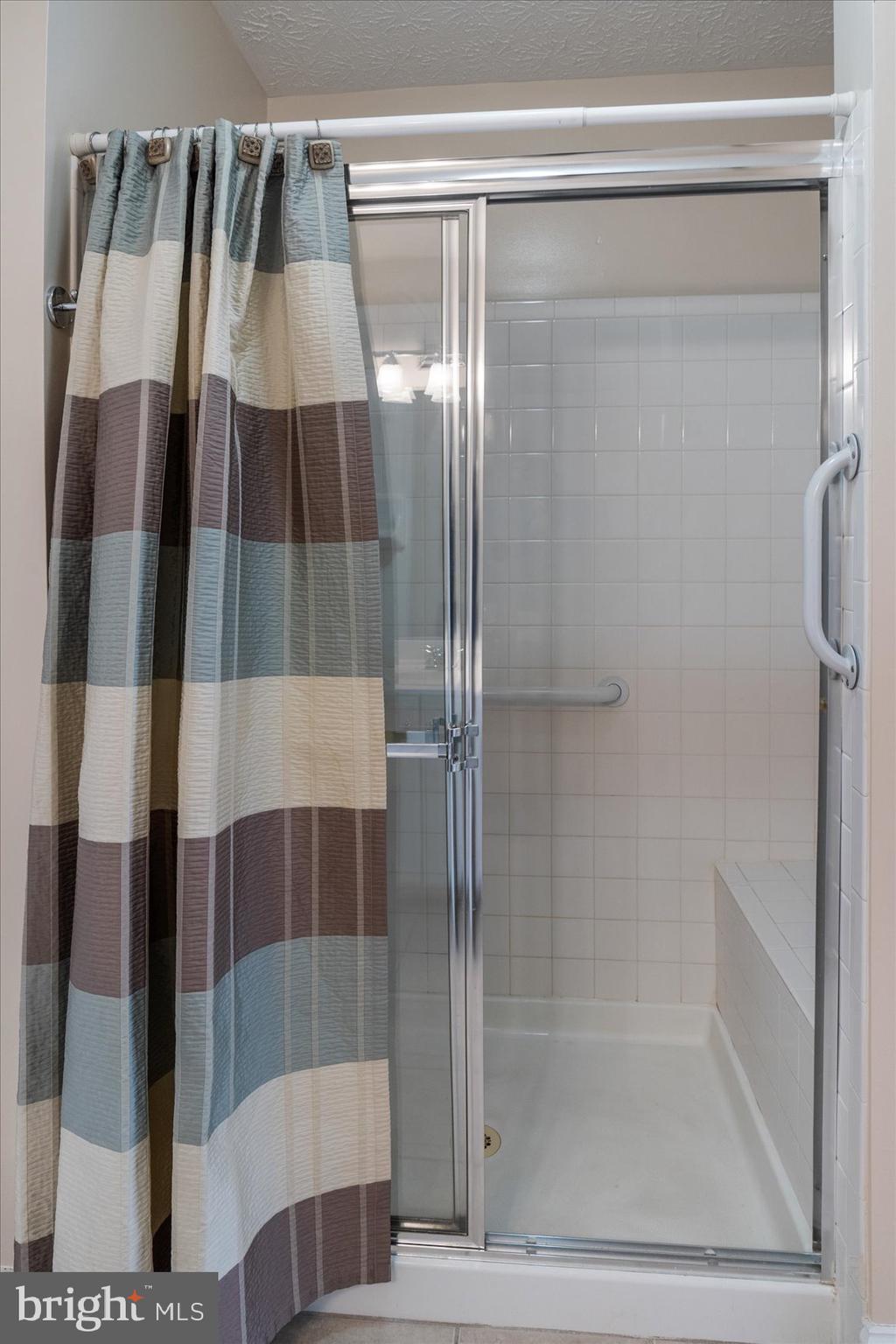9609 Haven Farm Road, Unit M Perry Hall, MD 21128 - Photo 26 of 42 Shower stall with built-in tile seat