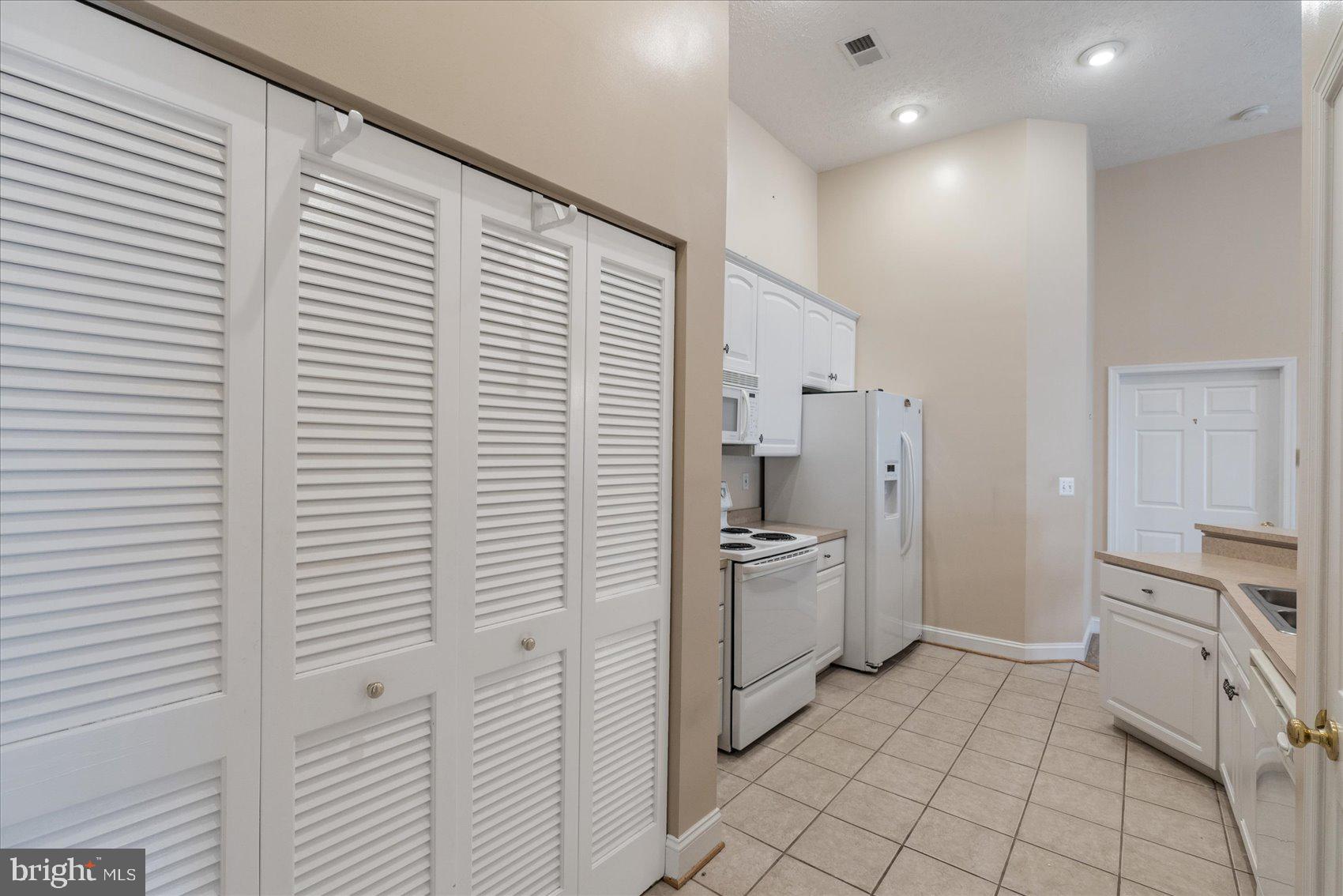 9609 Haven Farm Road, Unit M Perry Hall, MD 21128 - Photo 6 of 42 Laundry area with full size washer & dryer