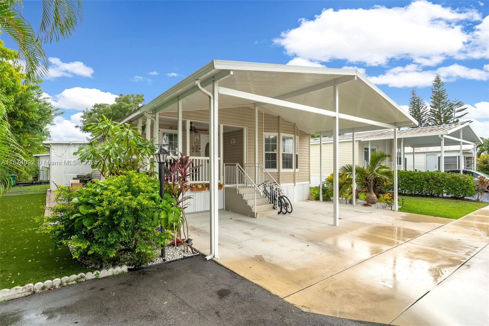 12850 West State Road, Unit 1 Davie, FL 33325 - Photo 18 of 32 a house view with a outdoor space