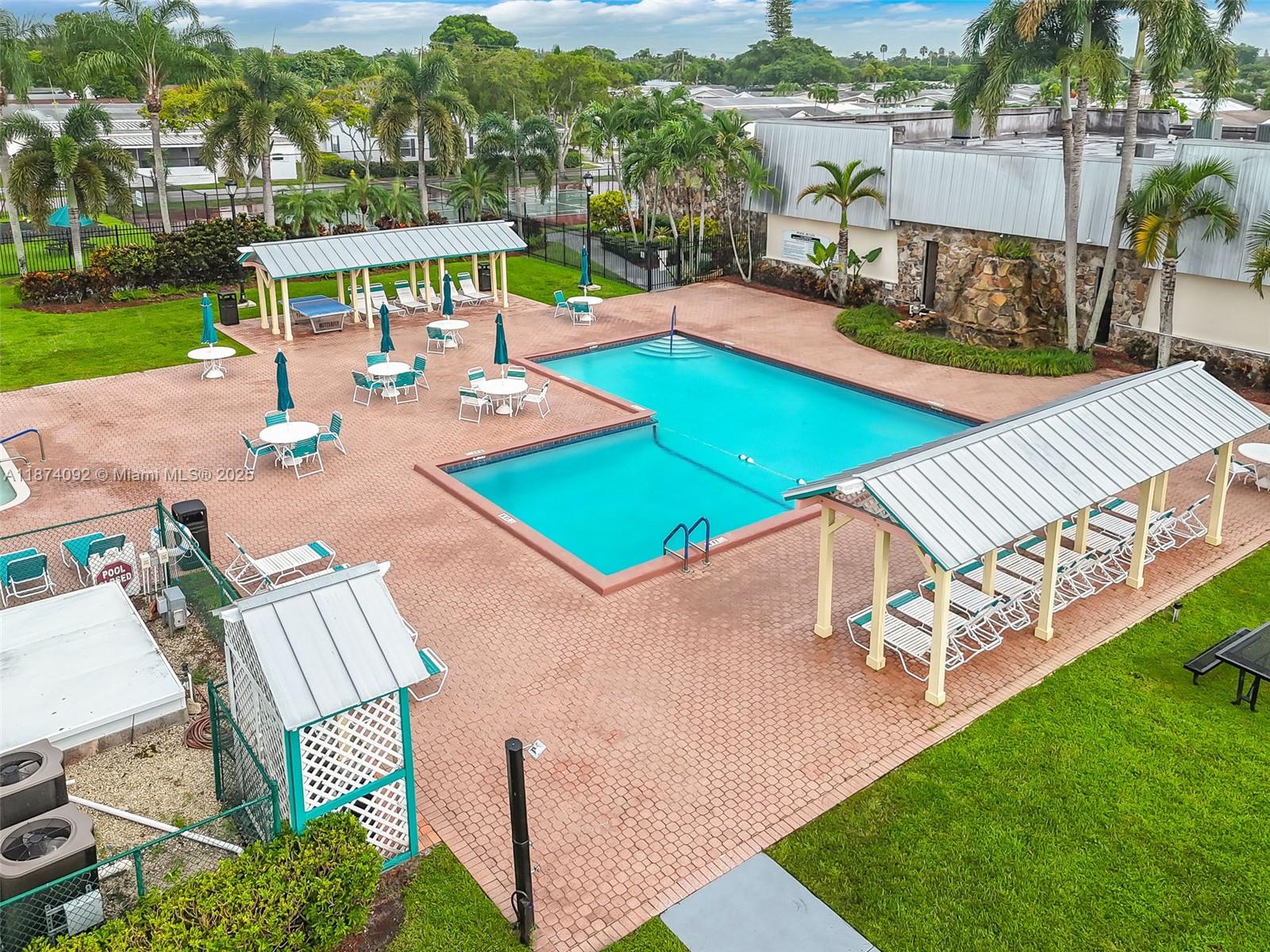 12850 West State Road, Unit 1 Davie, FL 33325 - Photo 22 of 32 an outdoor space with furniture and garden