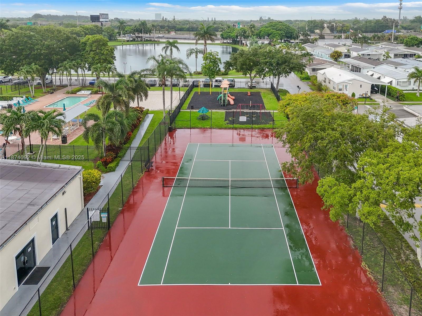 12850 West State Road, Unit 1 Davie, FL 33325 - Photo 23 of 32 an aerial view of tennis court