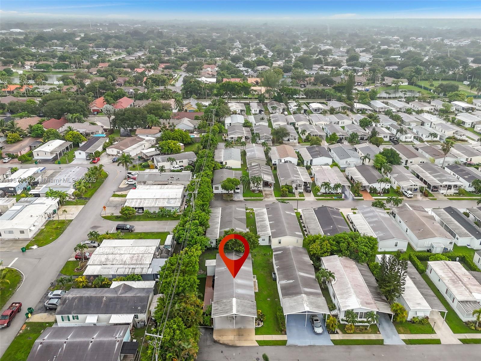 12850 West State Road, Unit 1 Davie, FL 33325 - Photo 32 of 32 an aerial view of residential building and lake view