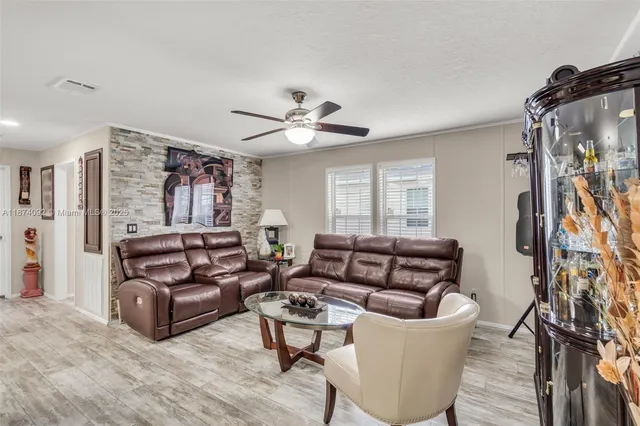 a living room with furniture and a window