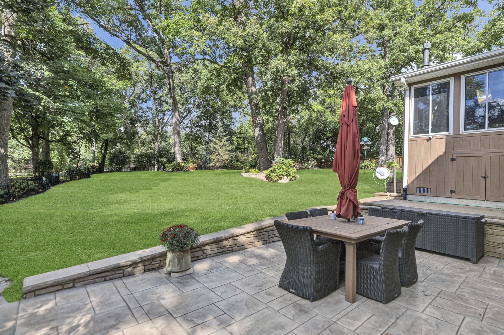 512 Forest Drive Addison, IL 60101 - Photo 12 of 61 a view of a backyard with sitting area