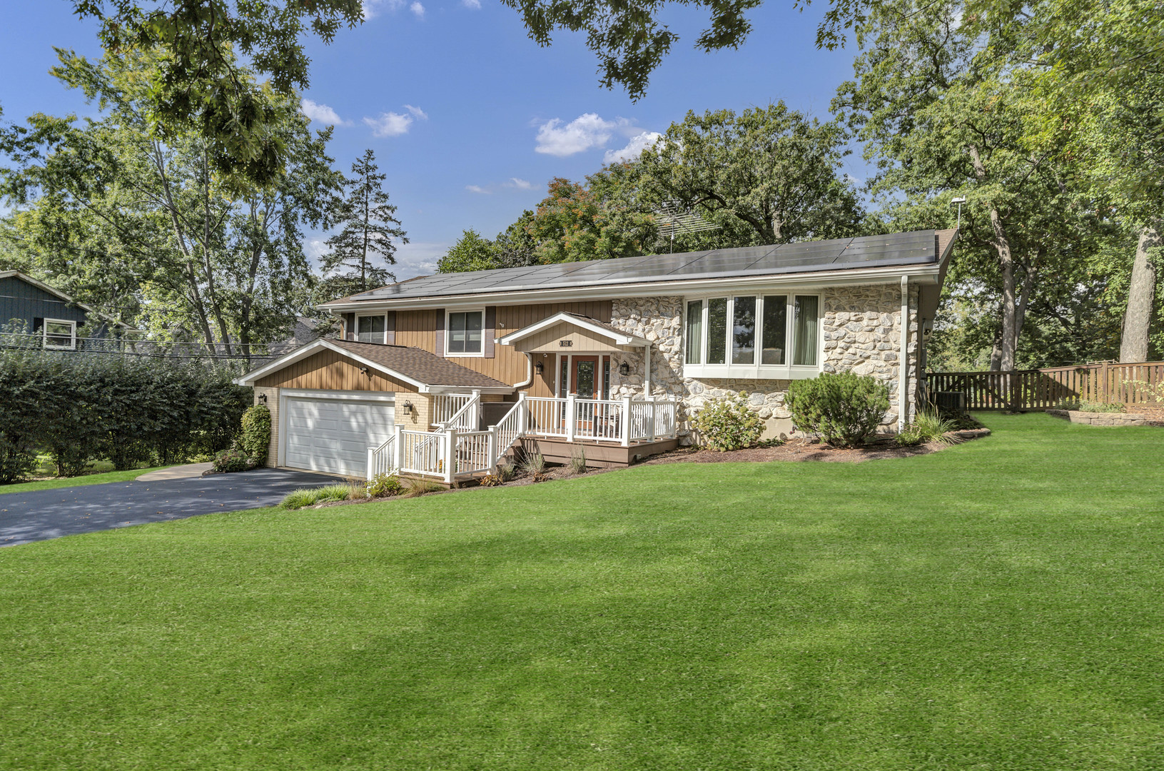 512 Forest Drive Addison, IL 60101 - Photo 2 of 61 front view of a house with a yard