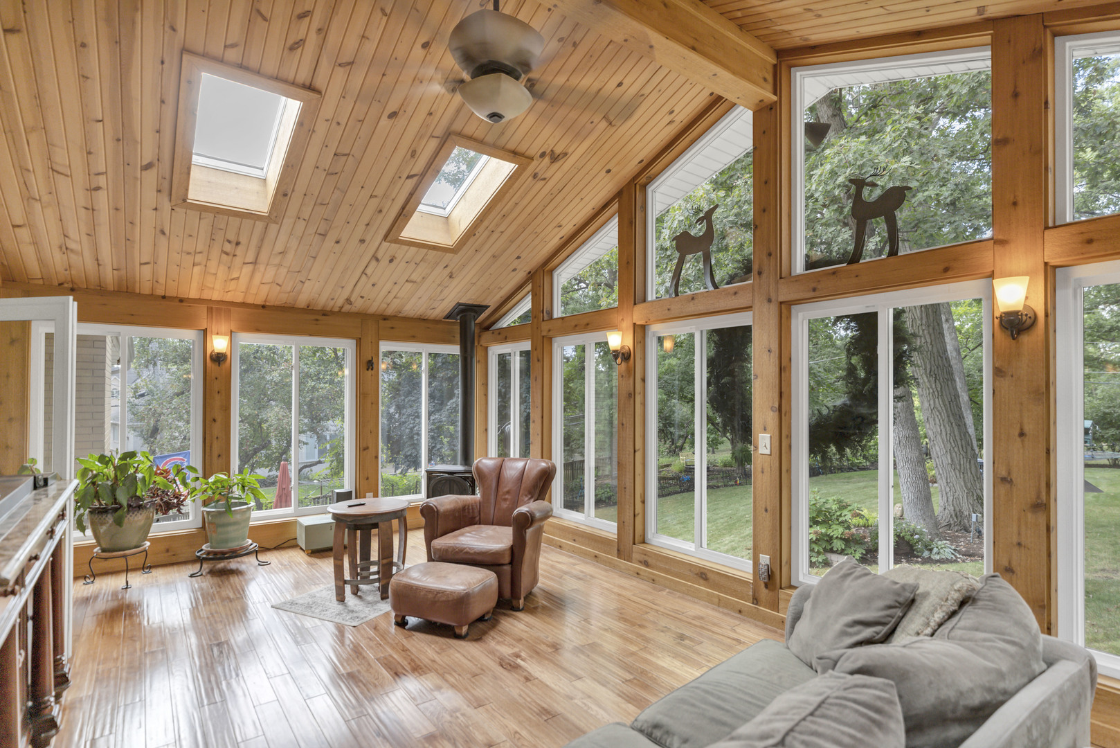 512 Forest Drive Addison, IL 60101 - Photo 24 of 61 a living room with furniture and a large window with wooden floor