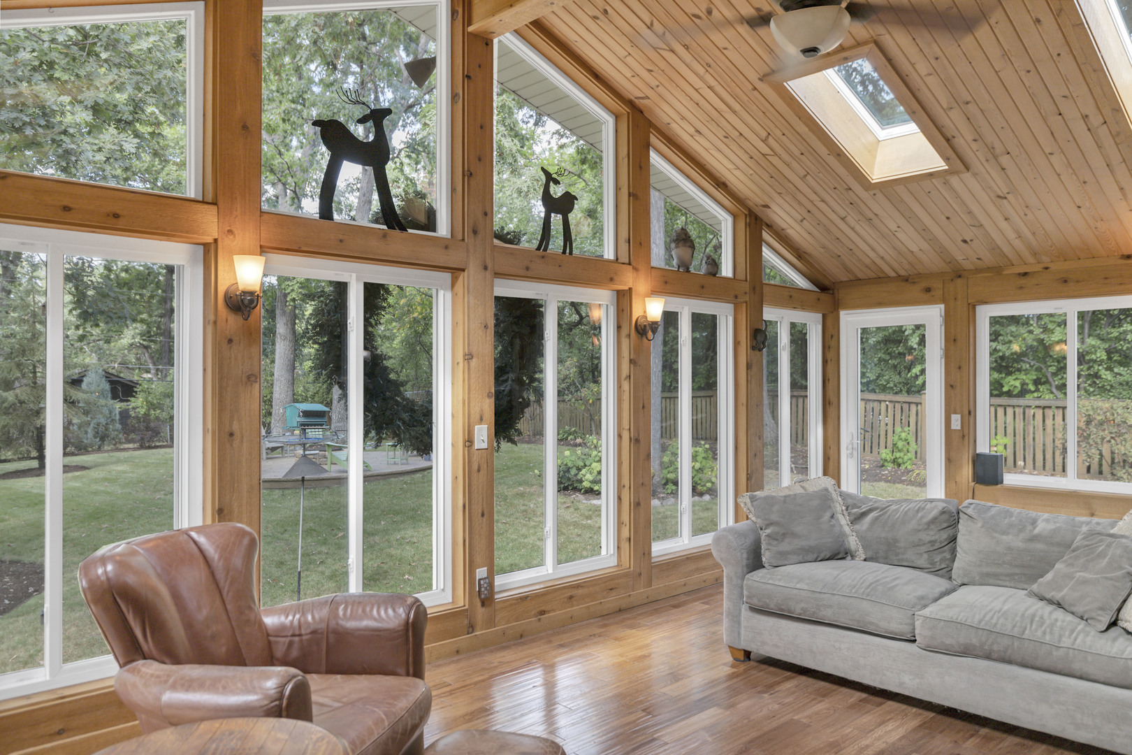 512 Forest Drive Addison, IL 60101 - Photo 25 of 61 a living room with furniture and floor to ceiling windows