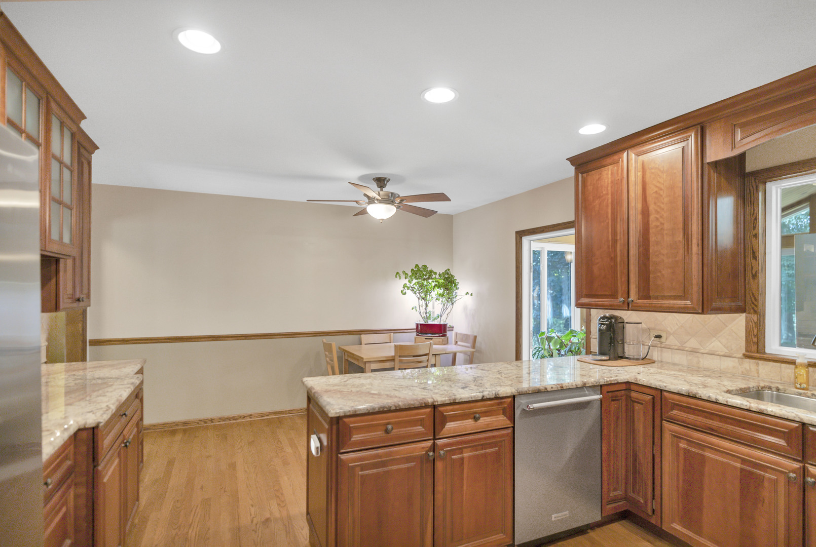 512 Forest Drive Addison, IL 60101 - Photo 32 of 61 a kitchen with a sink and cabinets