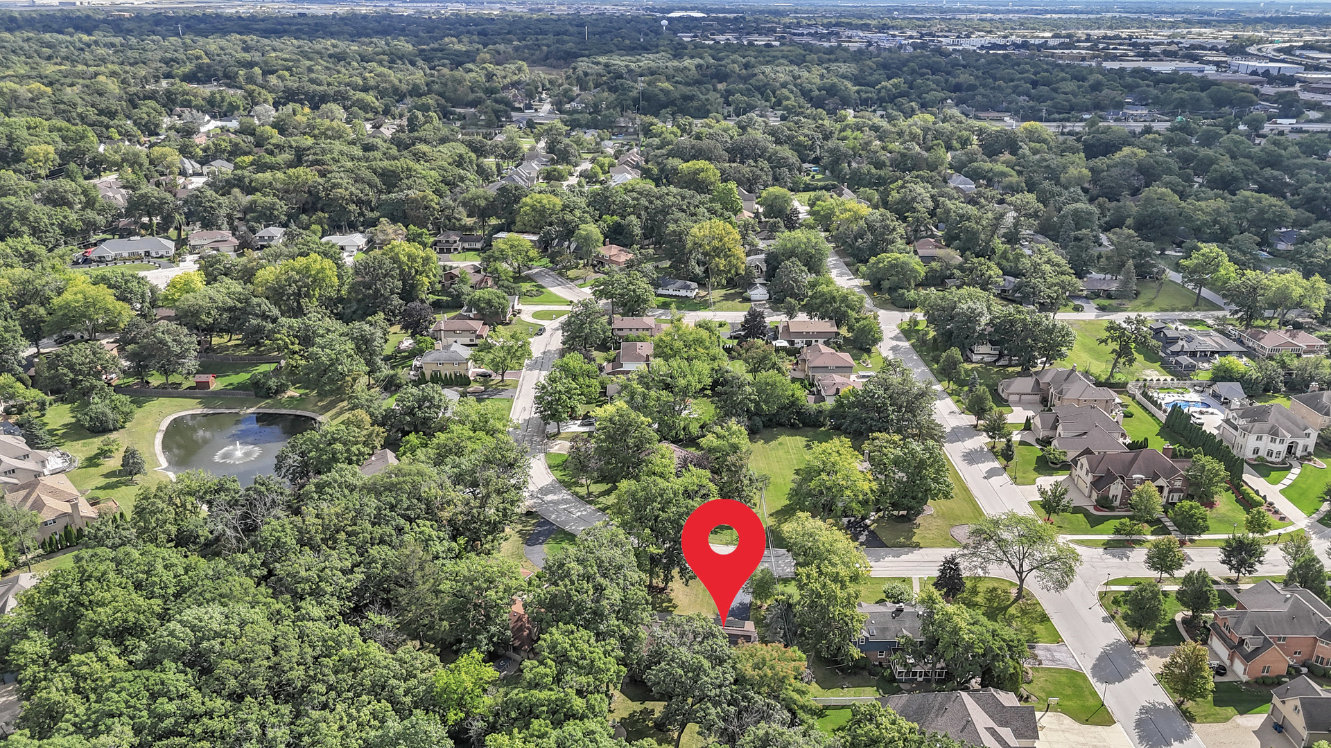 512 Forest Drive Addison, IL 60101 - Photo 59 of 61 an aerial view of a house with a yard and garden