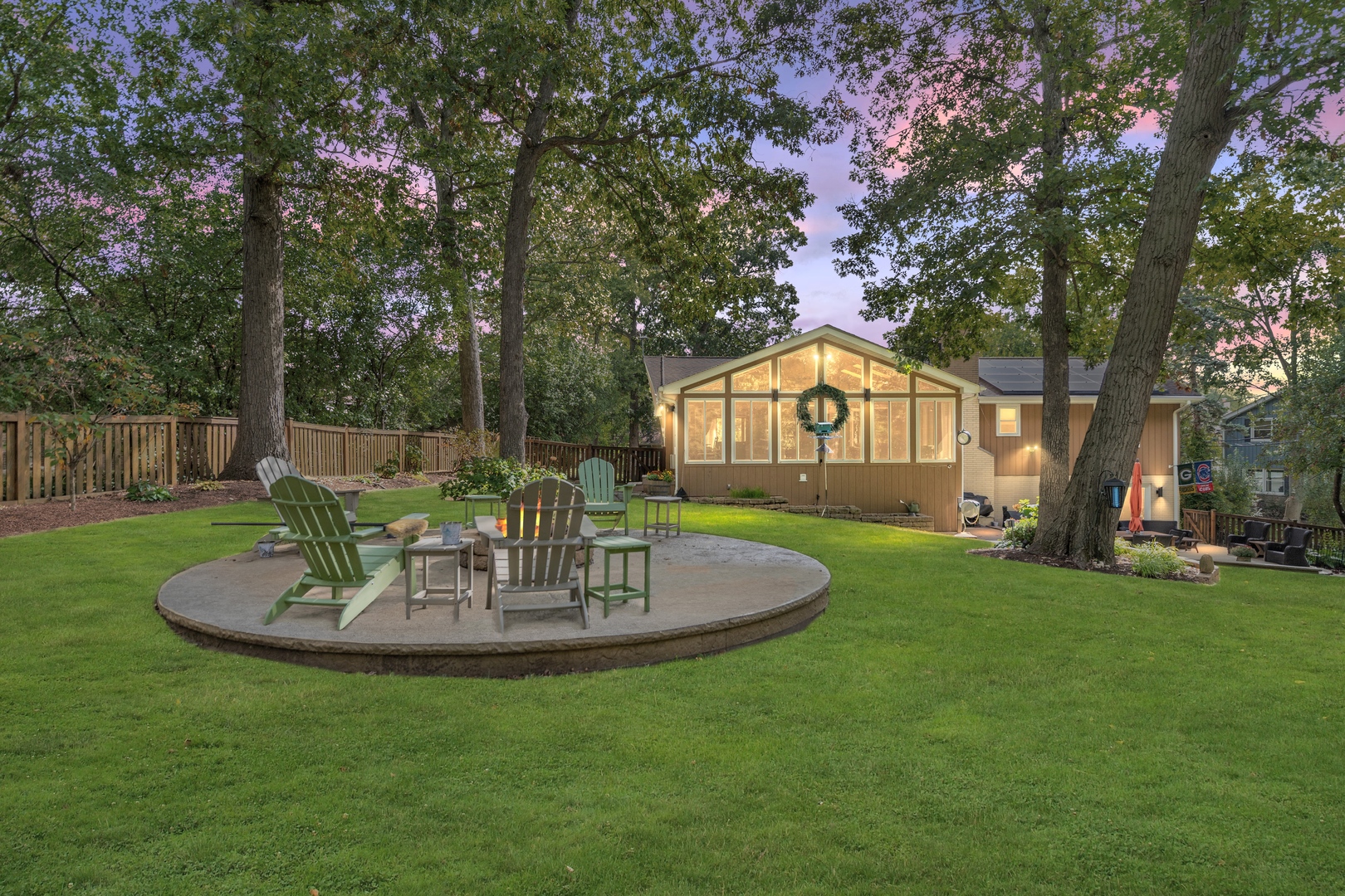 512 Forest Drive Addison, IL 60101 - Photo 7 of 61 a backyard of a house with table and chairs
