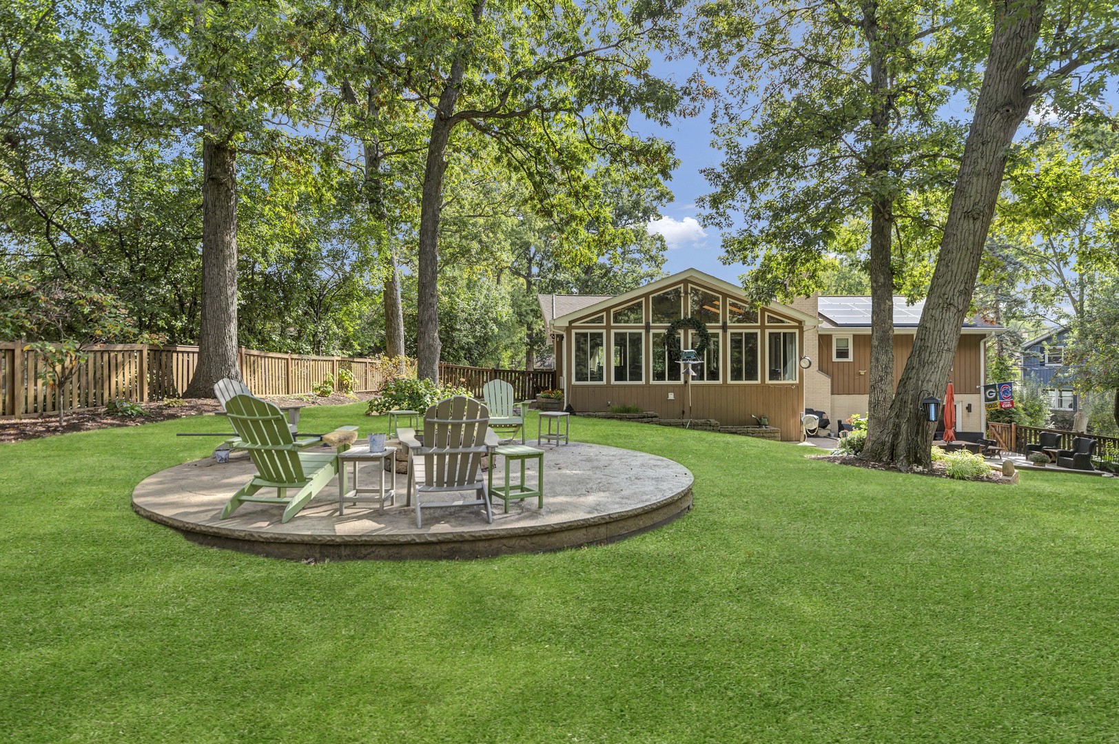 512 Forest Drive Addison, IL 60101 - Photo 8 of 61 a front view of a house with a garden and patio