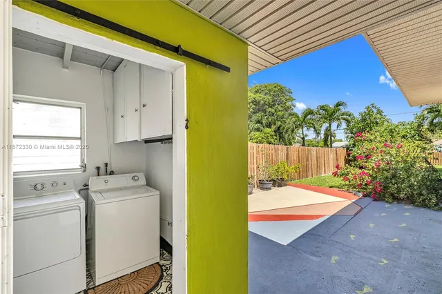 a utility room with dryer and washer