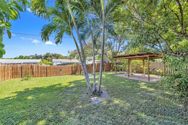 a view of a yard with a slide