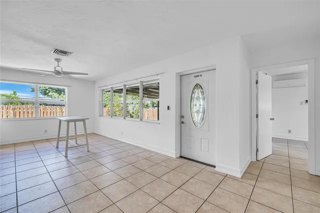 a view of an empty room and window