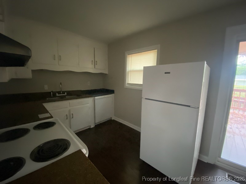 2711 Heatter Avenue Spring Lake, NC 28390 - Photo 6 of 14 a refrigerator freezer sitting inside of a kitchen