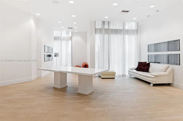 an empty room with entrance door