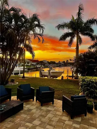 a view of a ocean with a lounge chairs