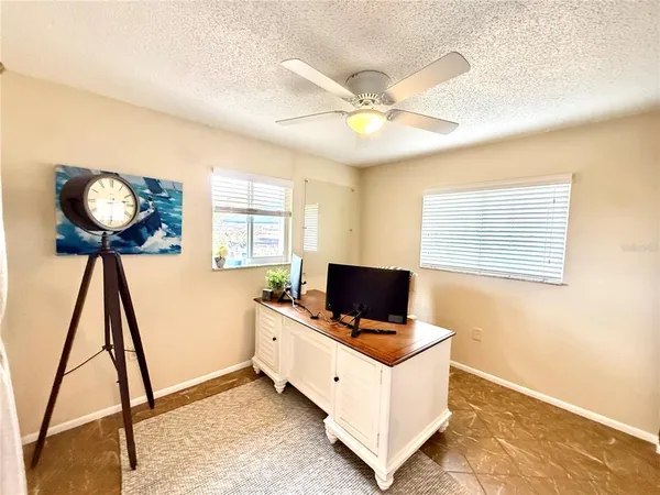 a room with furniture and a window