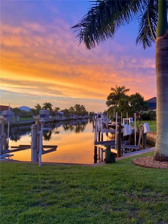 a view of a lake and a yard