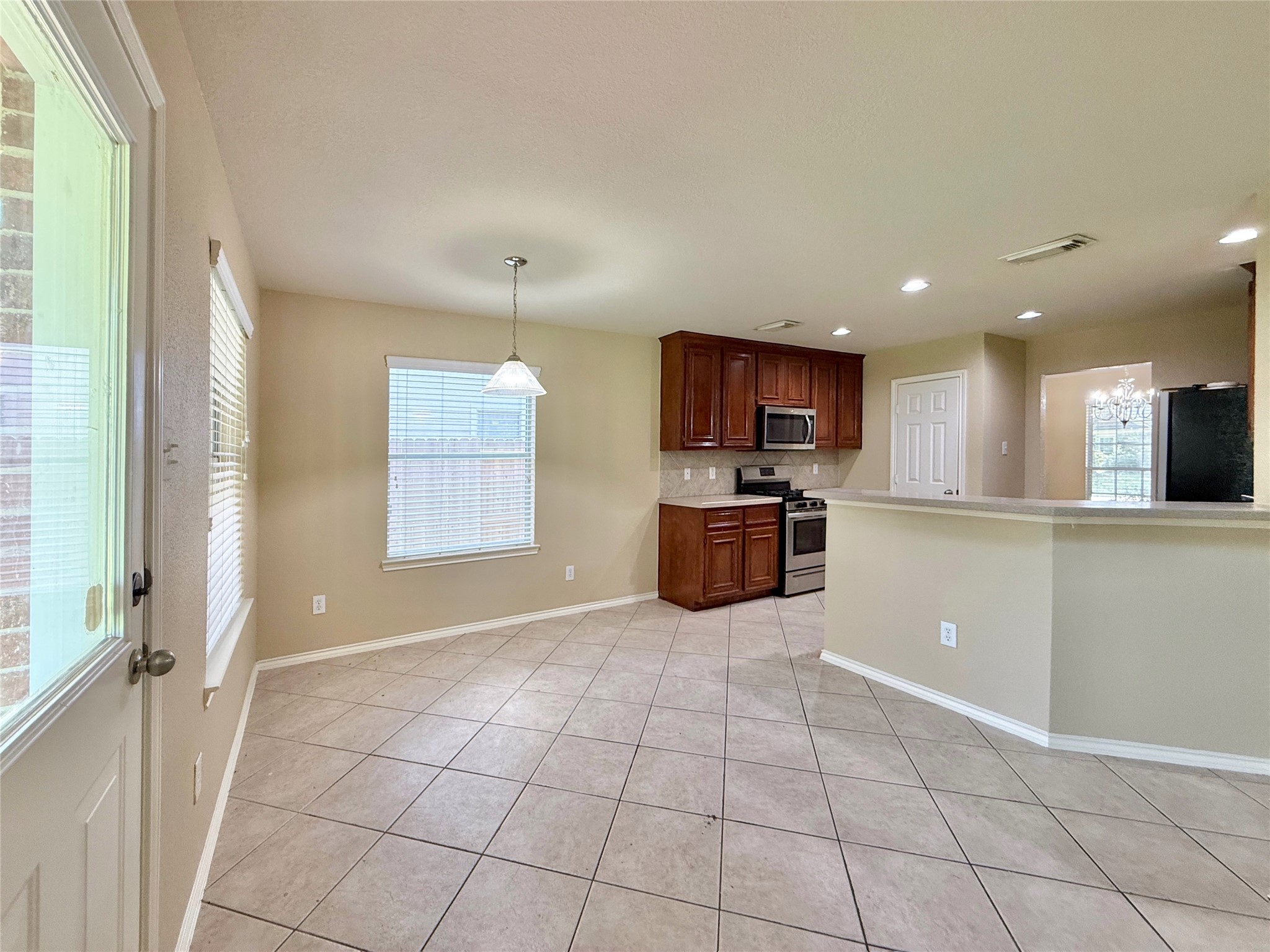 1810 Katlyn Lane Spring, TX 77386 - Photo 13 of 48 Step outside onto the back patio ...