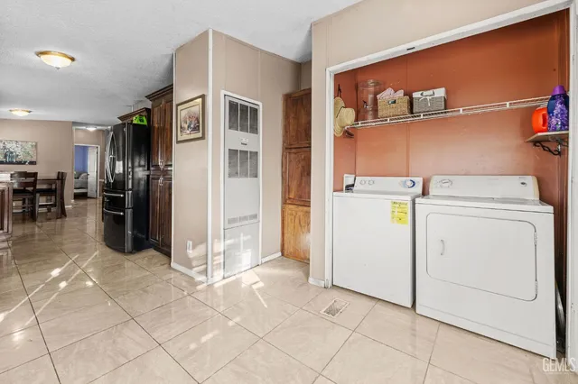 a view of a storage & utility room with washer and dryer