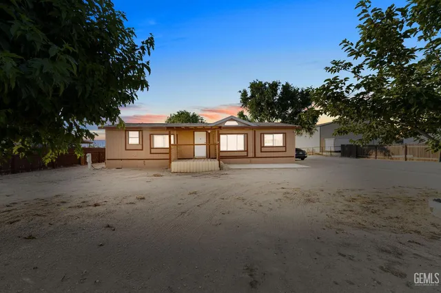 a view of a house with a street