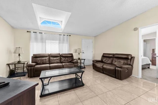 a living room with furniture and a couch