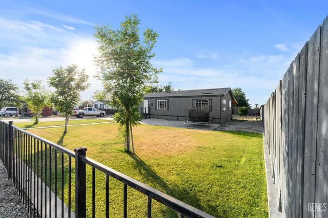a view of swimming pool with seating area