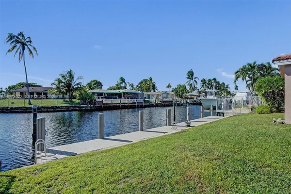 a view of a lake with a garden
