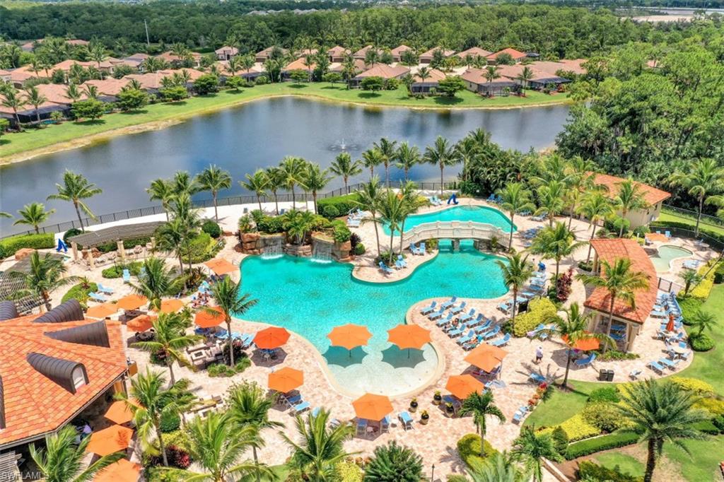 9530 Piacere Way Naples, FL 34113 - Photo 32 of 45 an aerial view of a house with outdoor space and lake view