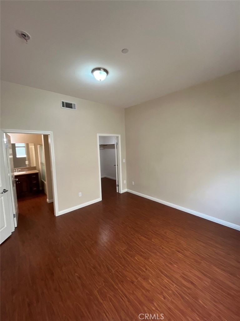 920 Central Riverside, CA 92507 - Photo 11 of 40 a view of empty room with wooden floor