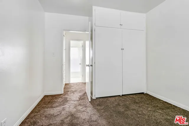 an empty room with closet
